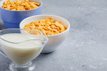 Corn flakes and milk. Healthy diet. Copy space