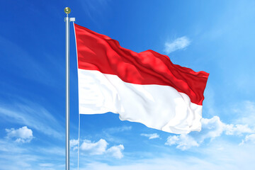 Naklejka na ściany i meble Indonesia flag waving on a high quality blue cloudy sky, 3d illustration