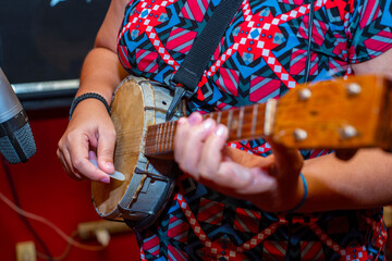 Banjo
A banjo is a string instrument from the lute family, with a circular body, with a closed circular opening at the top. It consists of a circular frame, currently produced in PVC, on which a skin 