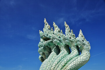 Multi Head Naka Statue Under Blue Sky