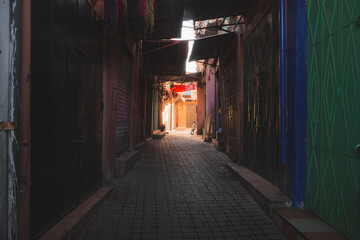Fototapeta premium Empty streets in the souks of Marrakech Medina, Morocco before shops open.