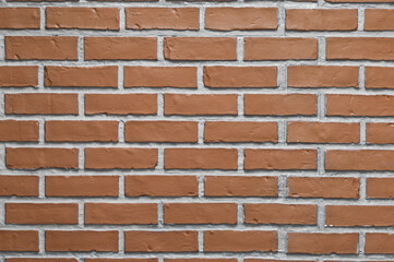 Obraz premium The cement wall is a brick shape.