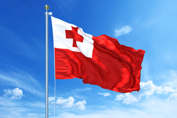 Naklejka na ściany i meble Tonga flag waving on a high quality blue cloudy sky, 3d illustration