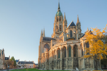 Fototapeta na wymiar The Bayeux Notre Dame Cathedral on a sunny afternoon in the historic centre of Bayeux in Normandy, France.
