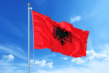 Fototapeta na wymiar Albania flag waving on a high quality blue cloudy sky, 3d illustration