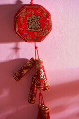   Chinese new year  Firecracker On Red Background (Chinese characters translated  in the article...