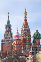 Fototapeta na wymiar St. Basil's Cathedral and the Spasskaya Tower of the Moscow Kremlin on Red Square