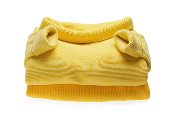 Obraz na płótnie Canvas Yellow woolen sweaters on white background. Warm clothes