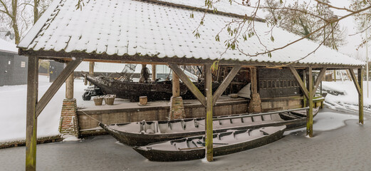 Old boats in a dock in Giethoorn