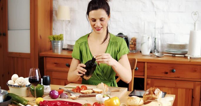 Beautiful woman preparing delicious spring food from fresh vegetables
