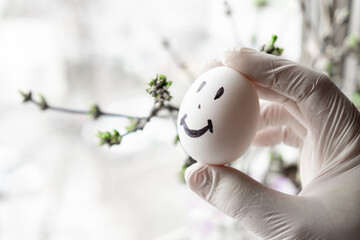 Urology concept. Male problems, infertility, decreased testosterone. Chicken eggs in hand with a...