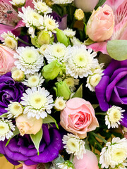 Bright beautiful floral background, texture of different natural flowers. Studio Photo