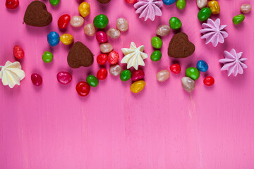 Sweets on a pink table. Valentine's day.