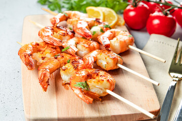  Grilled prawns on wooden skewers, shrimp kebab