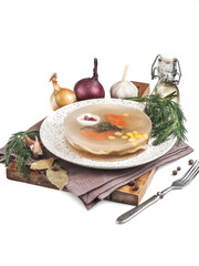 food photography of traditional russian dish, fish jelly (holodets, holodetz) side view. Fish aspic decorated with carrot, corn, egg, dill on white background close up	