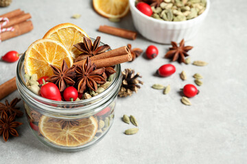 Aroma potpourri with different spices on white table, space for text