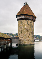 View on the tower from the Kapellbrücke in the city of Lucerne in central Switzerland