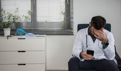 Young and confident male doctor portrait. Successful doctor career concept.