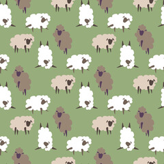 funny lambs on a green meadow seamless pattern