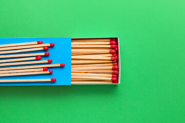 Fototapeta premium Box with matches on color background