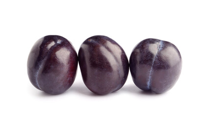 Ripe plums on white background