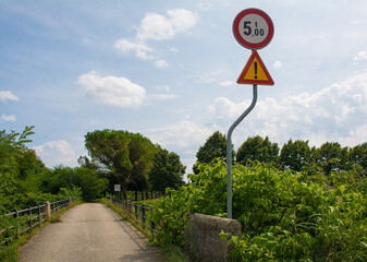 A warning sign on a narrow rural bridge in Friuli-Venezia Giulia, north east Italy, indicates that the maximjum weight for vehicles is 5 tonnes
