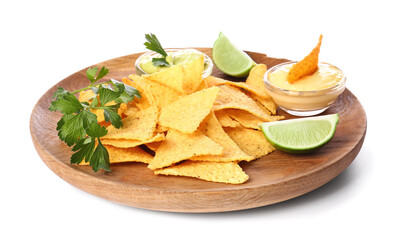 Board with tasty nachos and sauces on white background