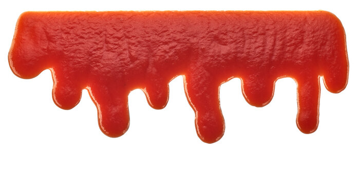 Close-up of ketchup drips isolated on white