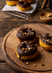 Donuts on wooden table background