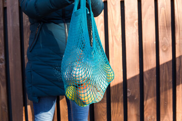 Zero waste lifestyle. Stylish blue mesh shopping bag