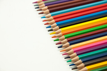 colored pencils on a white background. education concept. illustration of training.