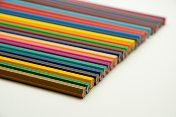 colored pencils on a white background. education concept. illustration of training.