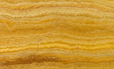 Natural stone travertine yellow color with an interesting pattern, called Travertino Giallo
