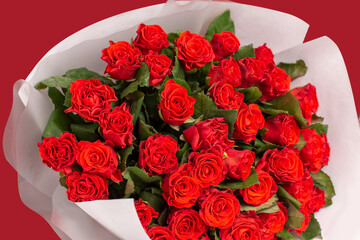 Red roses in a huge beautiful bouquet