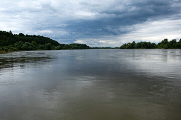 wide Vistula river and storm clouds in Kazimierz Dolny, Poland