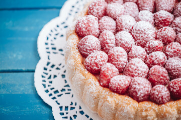 Delicious french Charlotte cake with raspberries