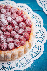 Delicious french Charlotte cake with raspberries