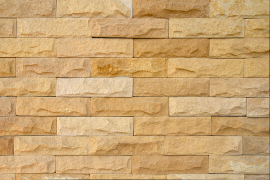 Sandstone wall background or texture