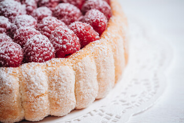 Delicious french Charlotte cake with raspberries