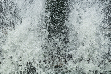 Splashes of water on black background