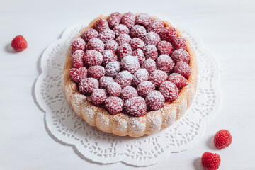 Delicious french Charlotte cake with raspberries