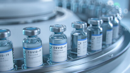 SARS-COV-2 COVID-19 Coronavirus Vaccine Mass Production in Laboratory, Bottles with Branded Labels...