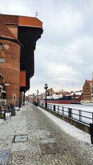 Gdansk, Poland - February 7, 2021: Old Town of Gdansk in Poland with Motlava river, Poland. Winter scenery.