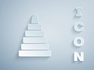 Paper cut Pyramid toy icon isolated on grey background. Paper art style. Vector.