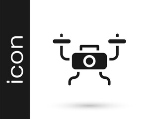 Black Drone flying icon isolated on white background. Quadrocopter with video and photo camera symbol. Vector.