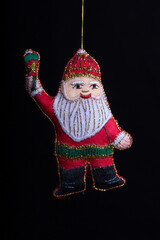 Christmas decorations for the tree on a black background. Santa Claus Father Christmas 