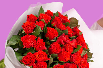 Red roses in a huge beautiful bouquet