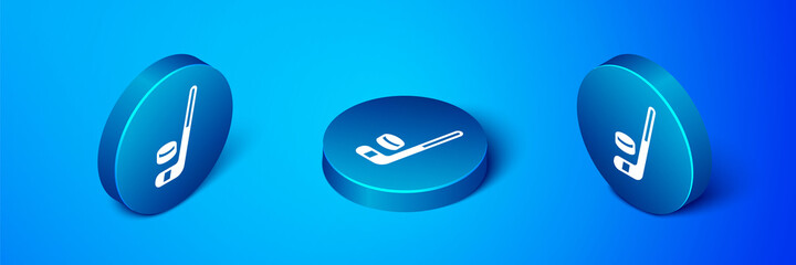 Isometric Ice hockey stick and puck icon isolated on blue background. Blue circle button. Vector.