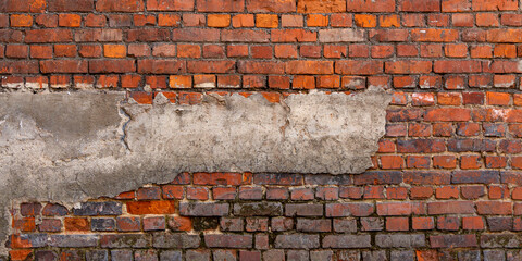 Dark brown, red old brickwork. Stone wall panorama. Exposed brickwork background, grunge texture. Wide banner, long wall with copy space for text.