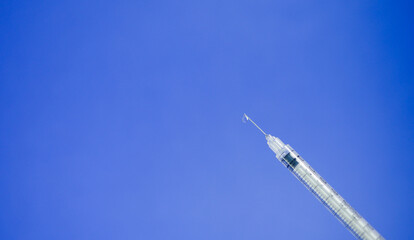 Close up insulin syringe. Vaccination concept. Copy space. Coronavirus protection banner